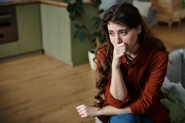 Person feeling overwhelmed